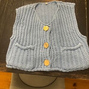 Blue sweater vest
